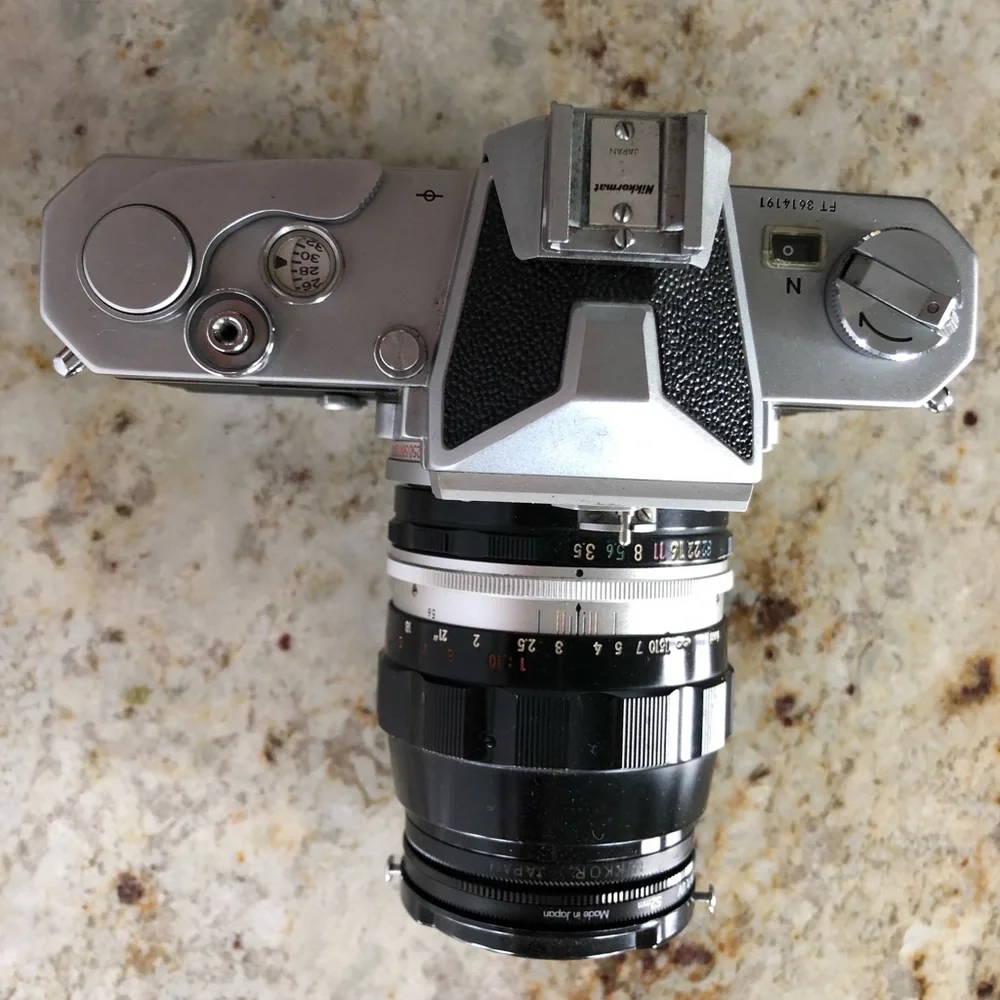 Nikon FTn camera w/own working light meter, 3 lenses, misc accessories!